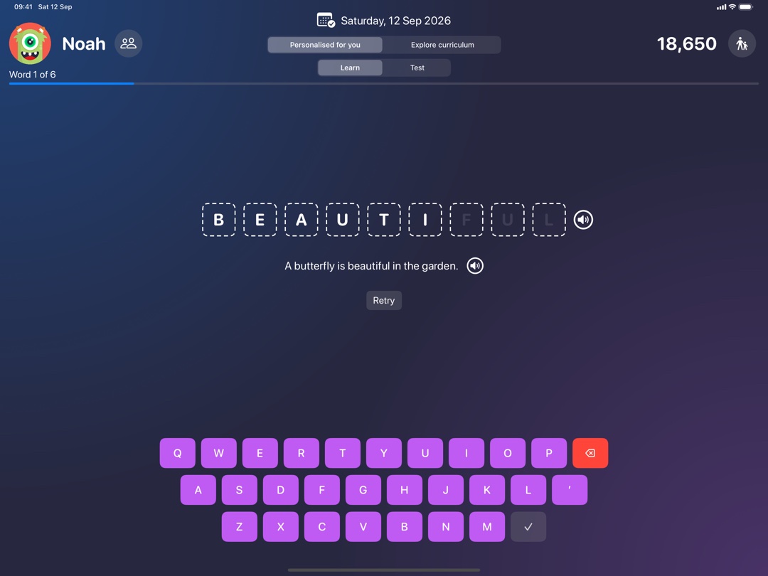 Createful Kids: Spellings on an iPad, with a word being typed into letter boxes above the coloured keyboard